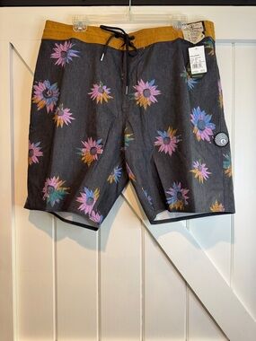 Volcom Black Floral Board Shorts with Mustard Waistband
